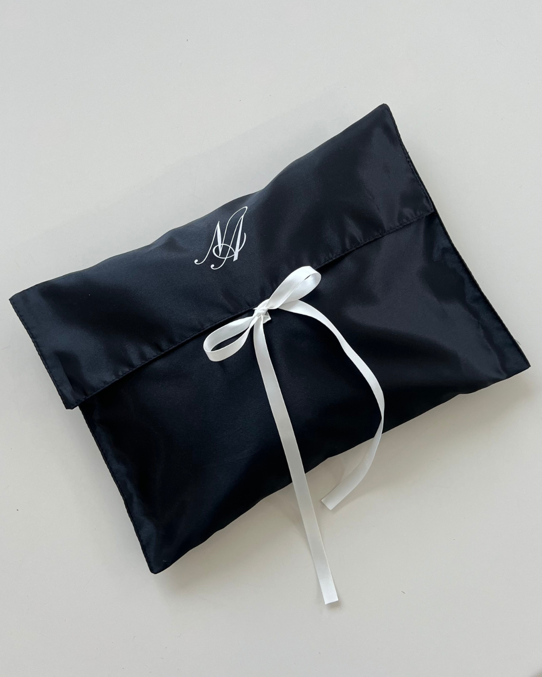 The Black Satin Pouch